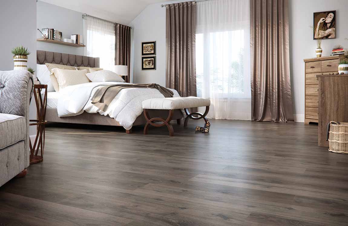 Laminate floors in a bedroom, installation services available.